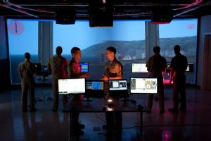 Navy ROTC students practice ship management during a virtual simulation at the James B. Hunt Library. Photo by Marc Hall