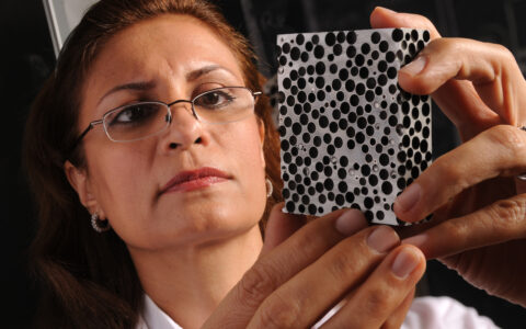 Afsaneh Rabiei checks on metallic foam created in her lab.